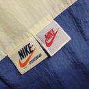 Jaqueta Corta Vento Nike 23/24 - Bege e Azul - KARIOCA MULTIMARCAS